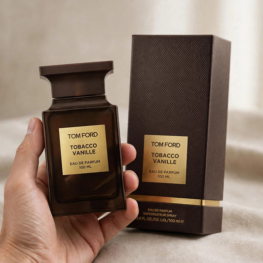 Hand holding Tom Ford Tobacco Vanille EDP perfume bottle