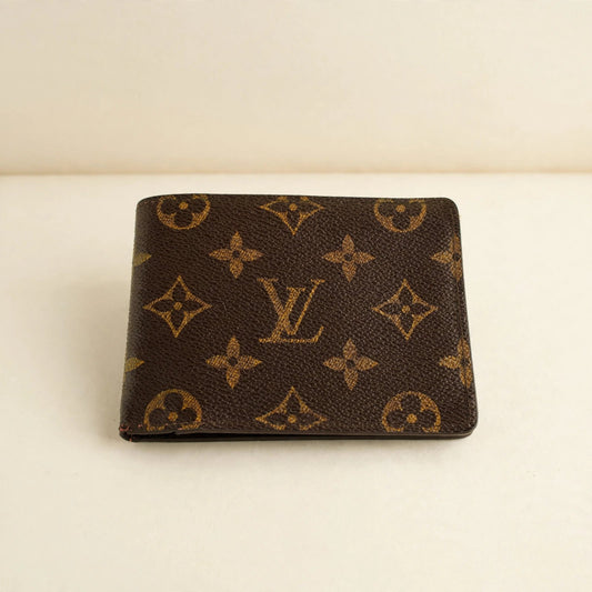 Louis Vuitton Engraved Monogram Wallet – Multiple Bifold — cream product photo