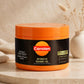Carroten Intensive Tanning Gel jar in a warm beige studio