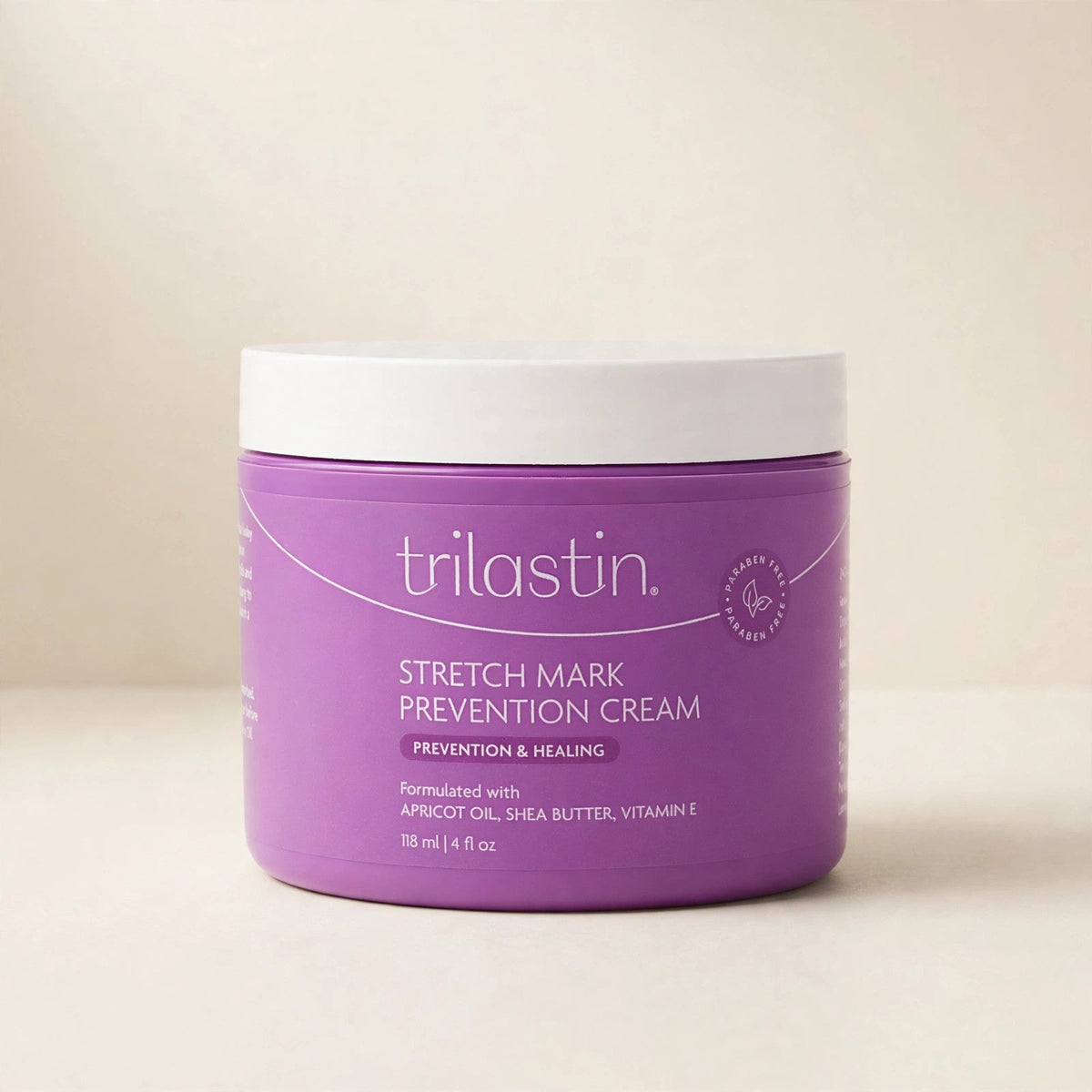 TriLASTIN stretch mark prevention cream jar in a cream studio