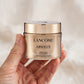 Lancôme Absolue Rich Cream jar held in hand