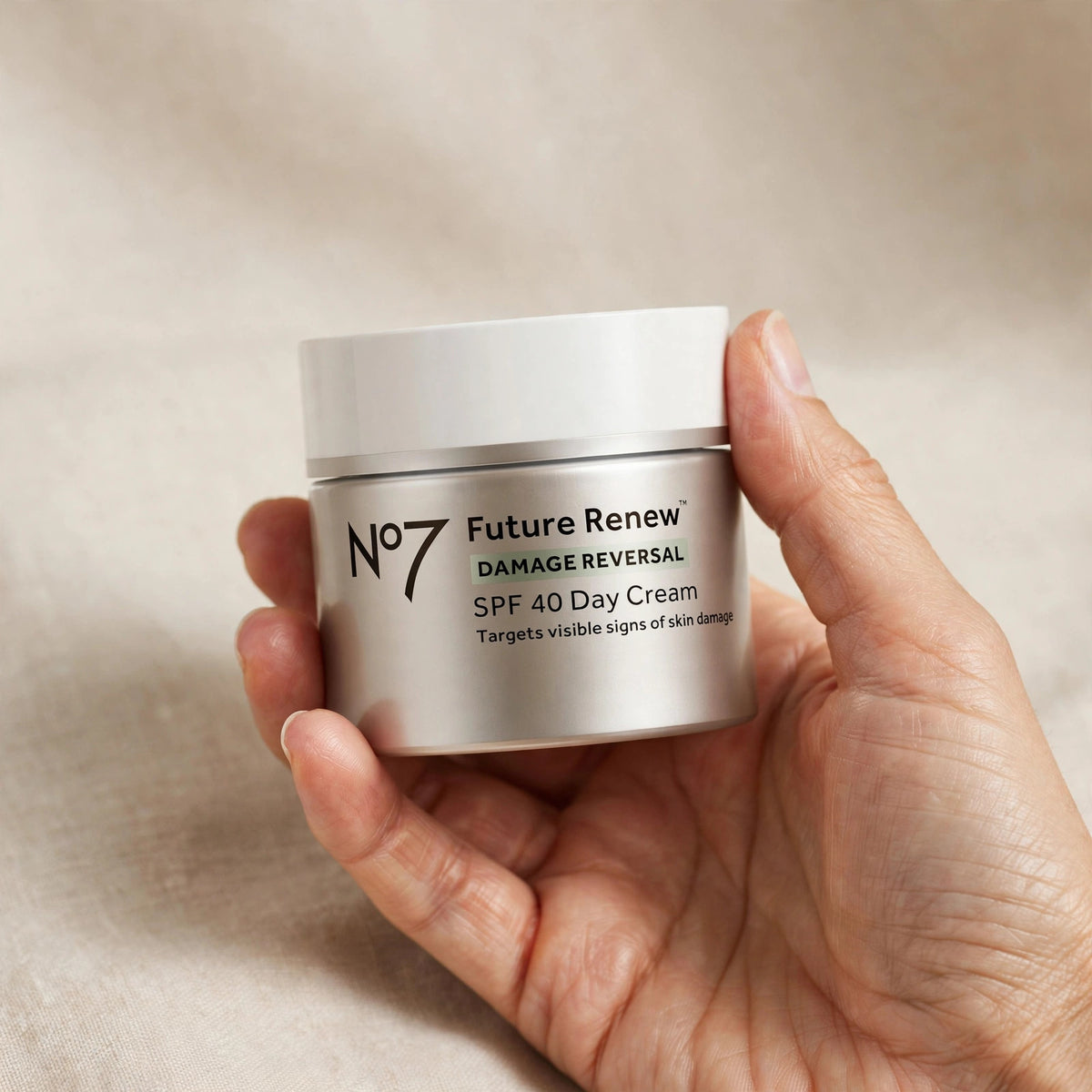 No7 Future Renew Day Cream SPF 40 held in hand