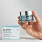 Elemis Pro-Collagen Overnight Matrix jar held in hand