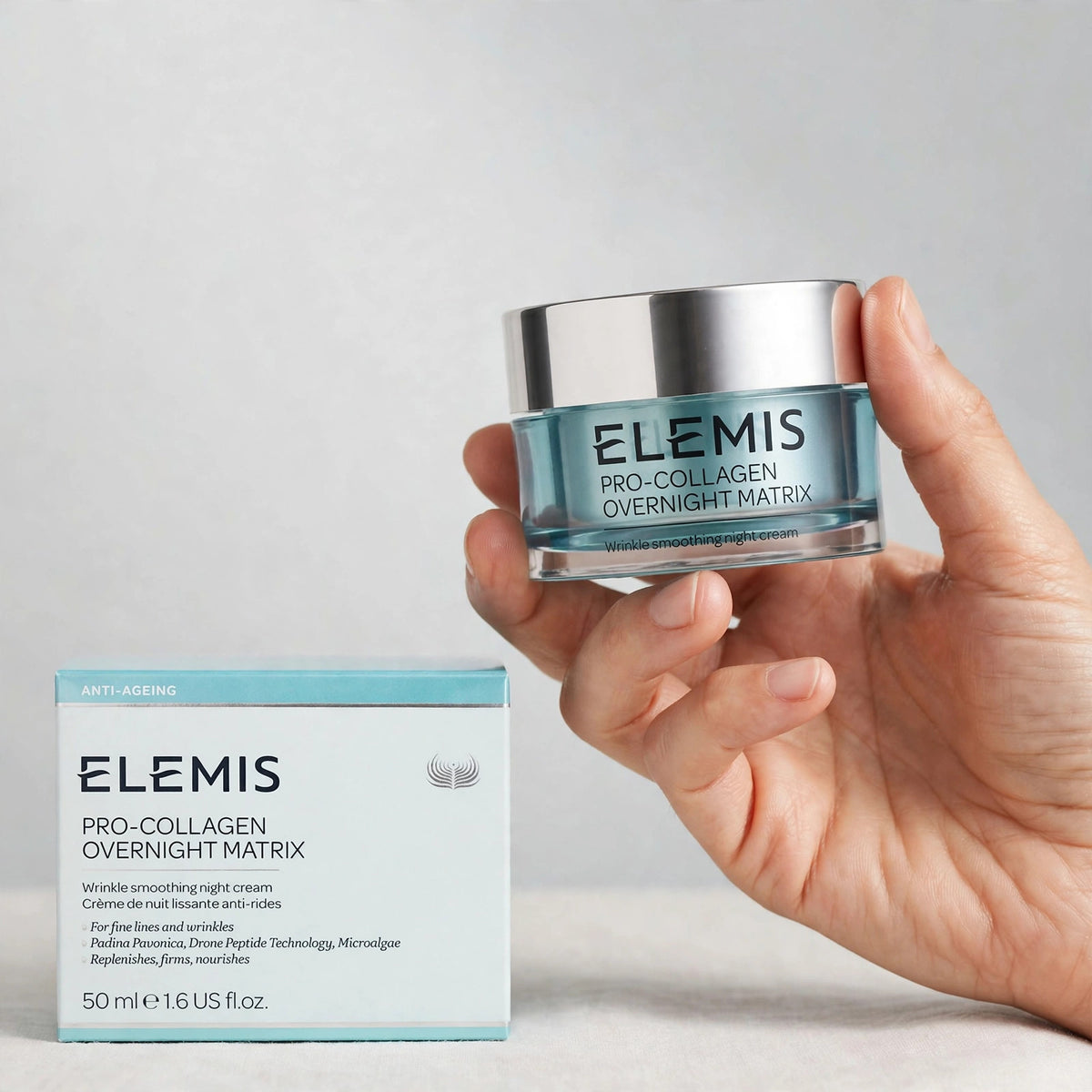 Elemis Pro-Collagen Overnight Matrix jar held in hand