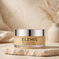 Elemis Pro-Collagen Cleansing Balm in warm beige studio setting