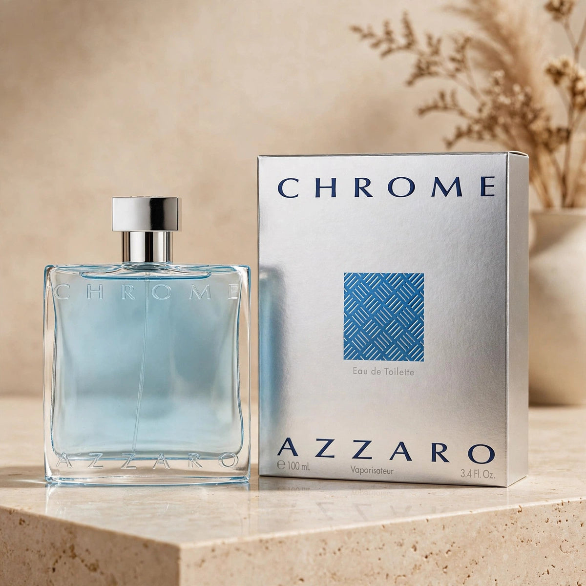 Azzaro Chrome Eau de Toilette 100ml / 3.3oz for Men bottle and box in warm beige studio