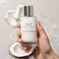 Hand holding Le Monde Gourmand Lait De Coco 108 bottle
