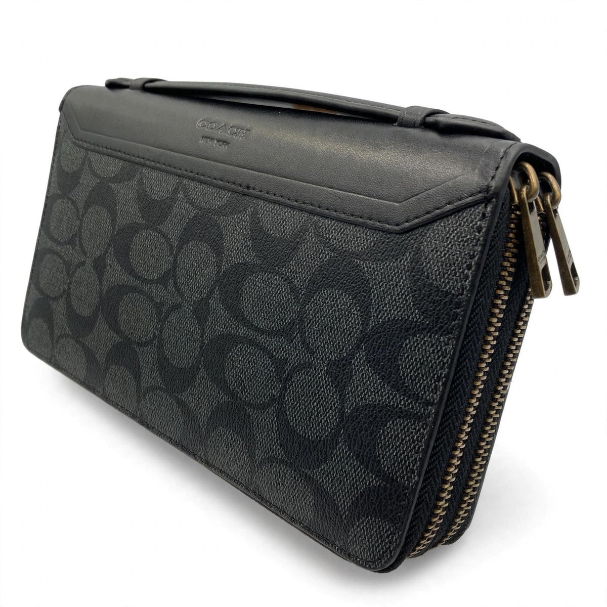 Coach men's travel organizer double zip embossed signature on white background