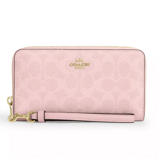 Coach CW778 long zip-around wallet in powder pink signature canvas on white background