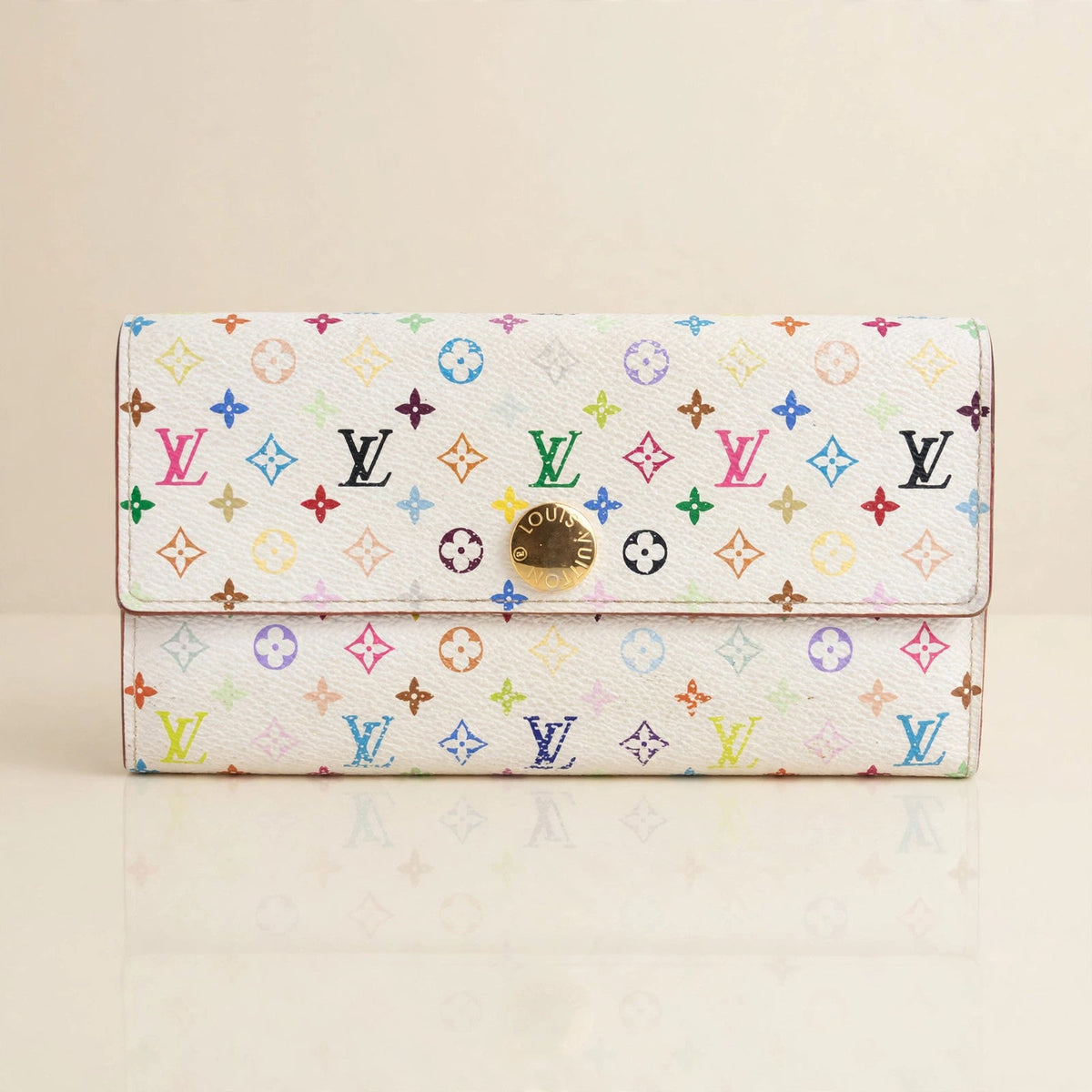 Louis Vuitton Portefeuille Sarah NM in monogram multicolore in a cream studio