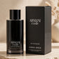 Armani Code Eau de Parfum bottle and box in warm beige studio