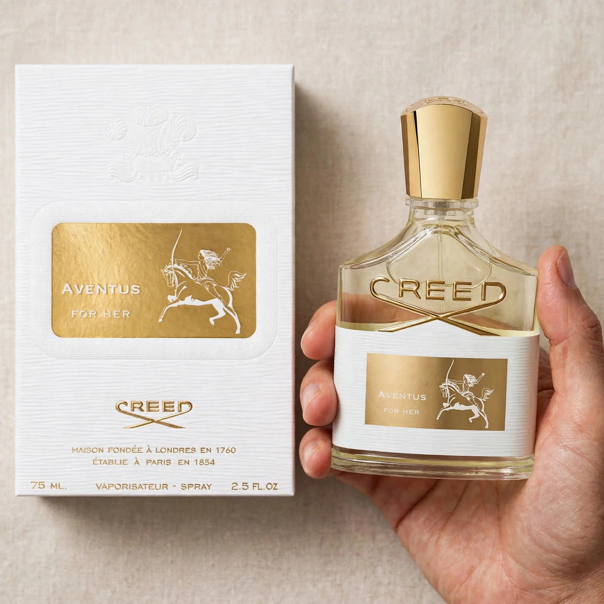 Creed Aventus For Her EDP 75ml — Held in hand