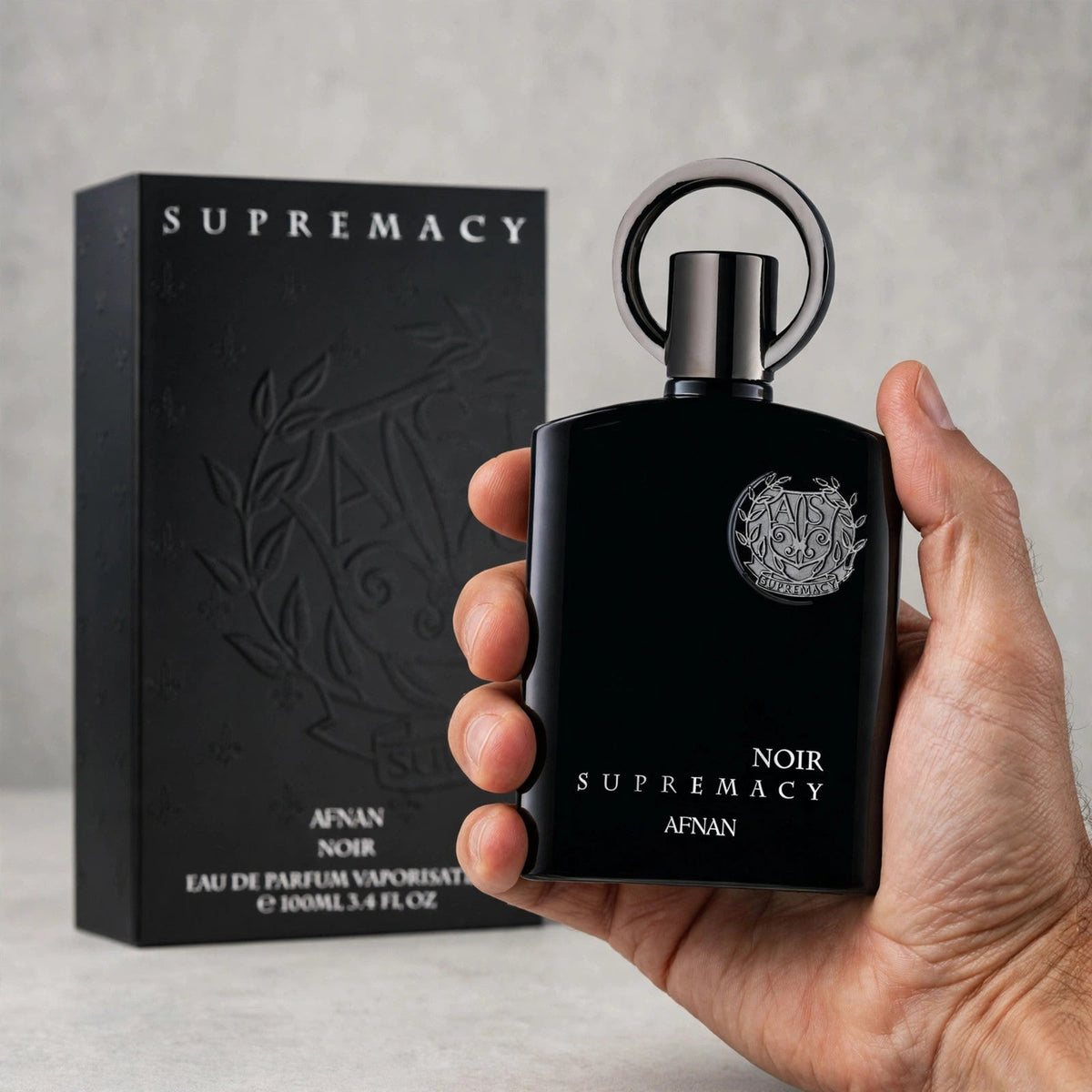 Afnan Supremacy Noir Eau de Parfum 100ml / 3.4oz — Held in hand