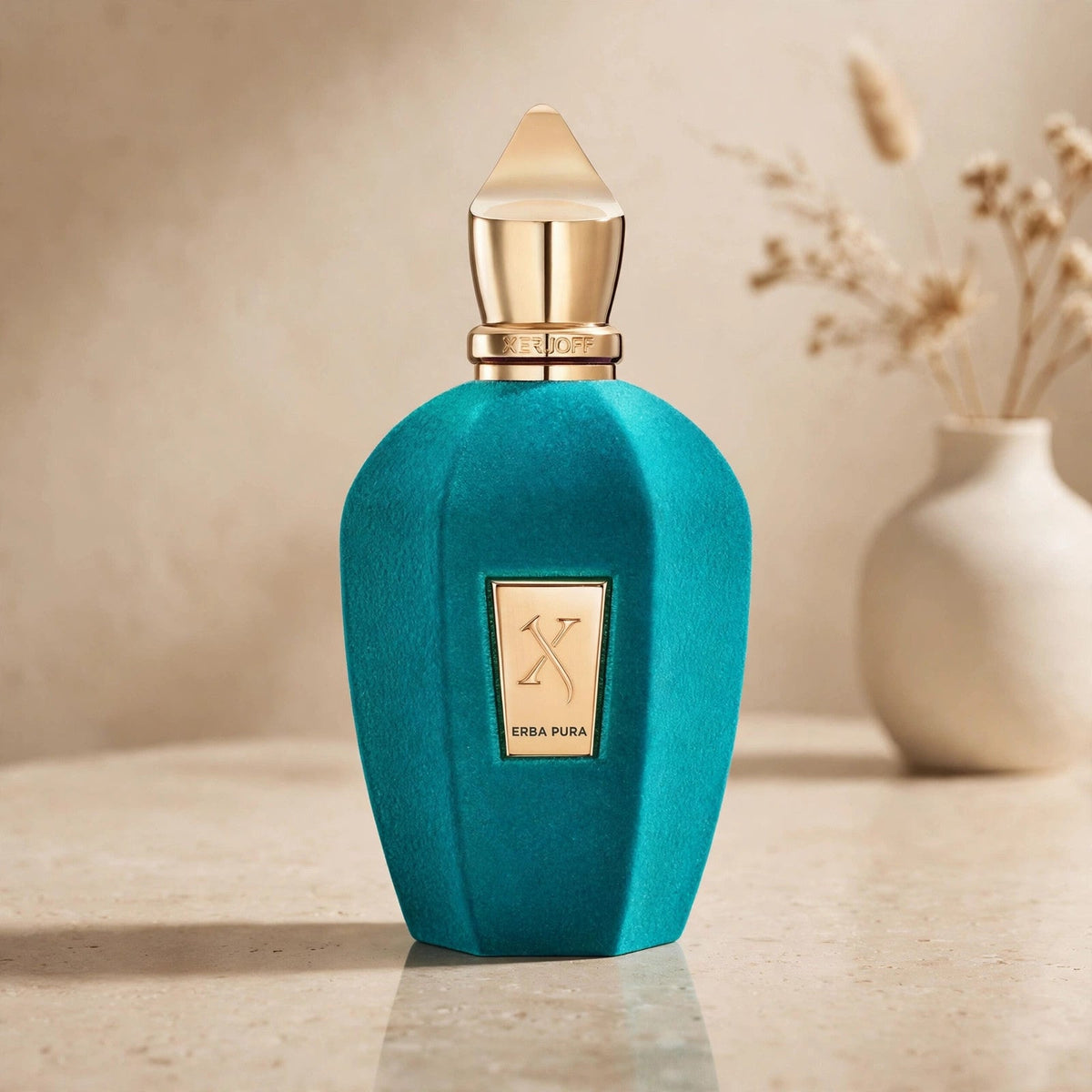 Xerjoff Erba Pura Eau de Parfum bottle in warm setting