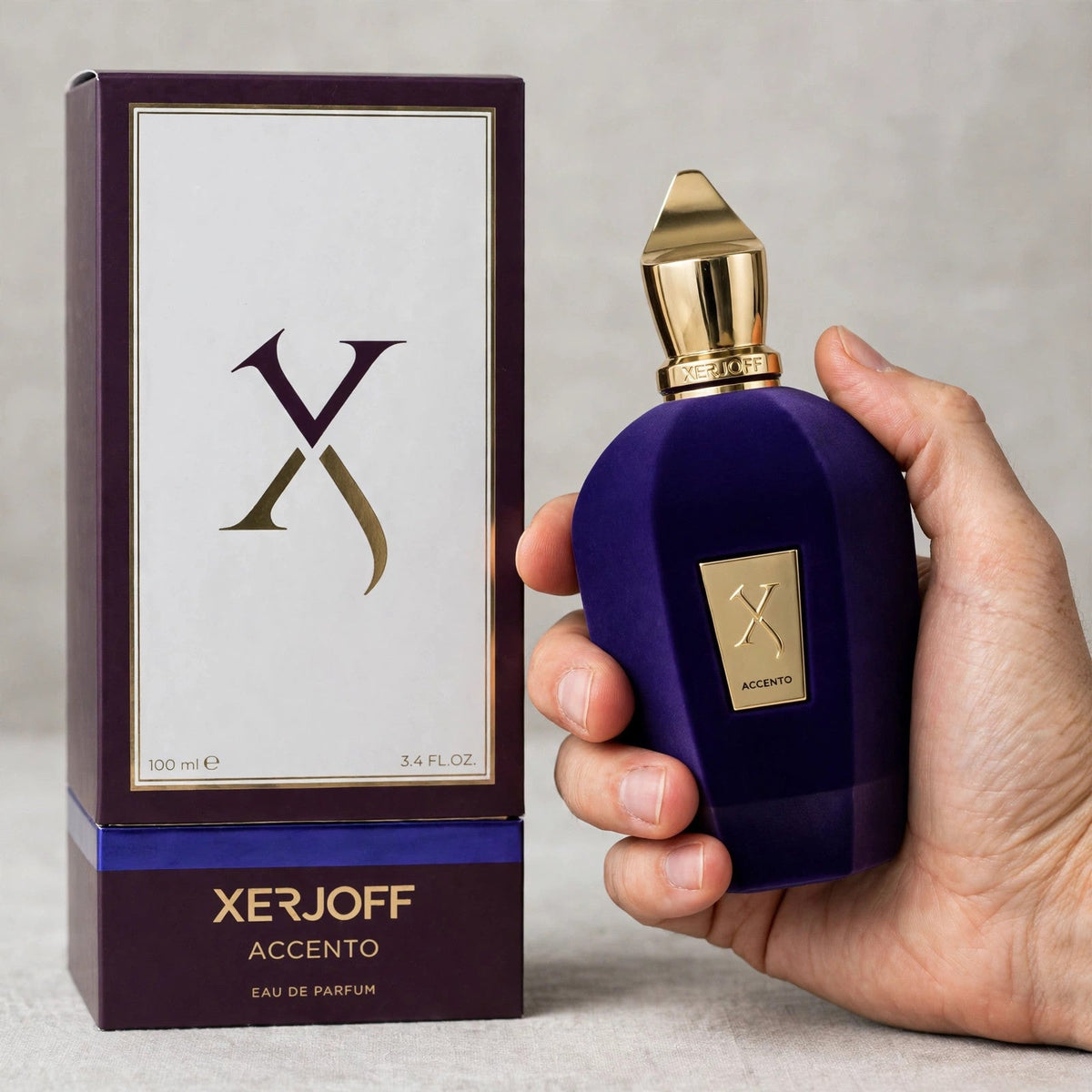 Xerjoff Accento Eau de Parfum bottle in hand setting