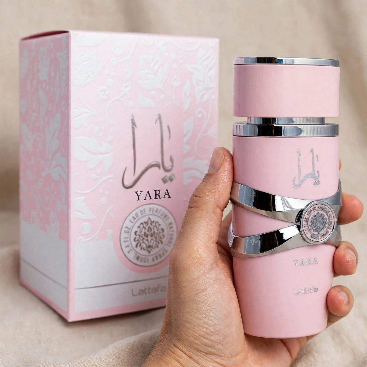 Lattafa Yara Eau de Parfum 100ml / 3.4oz for Unisex — Held in hand