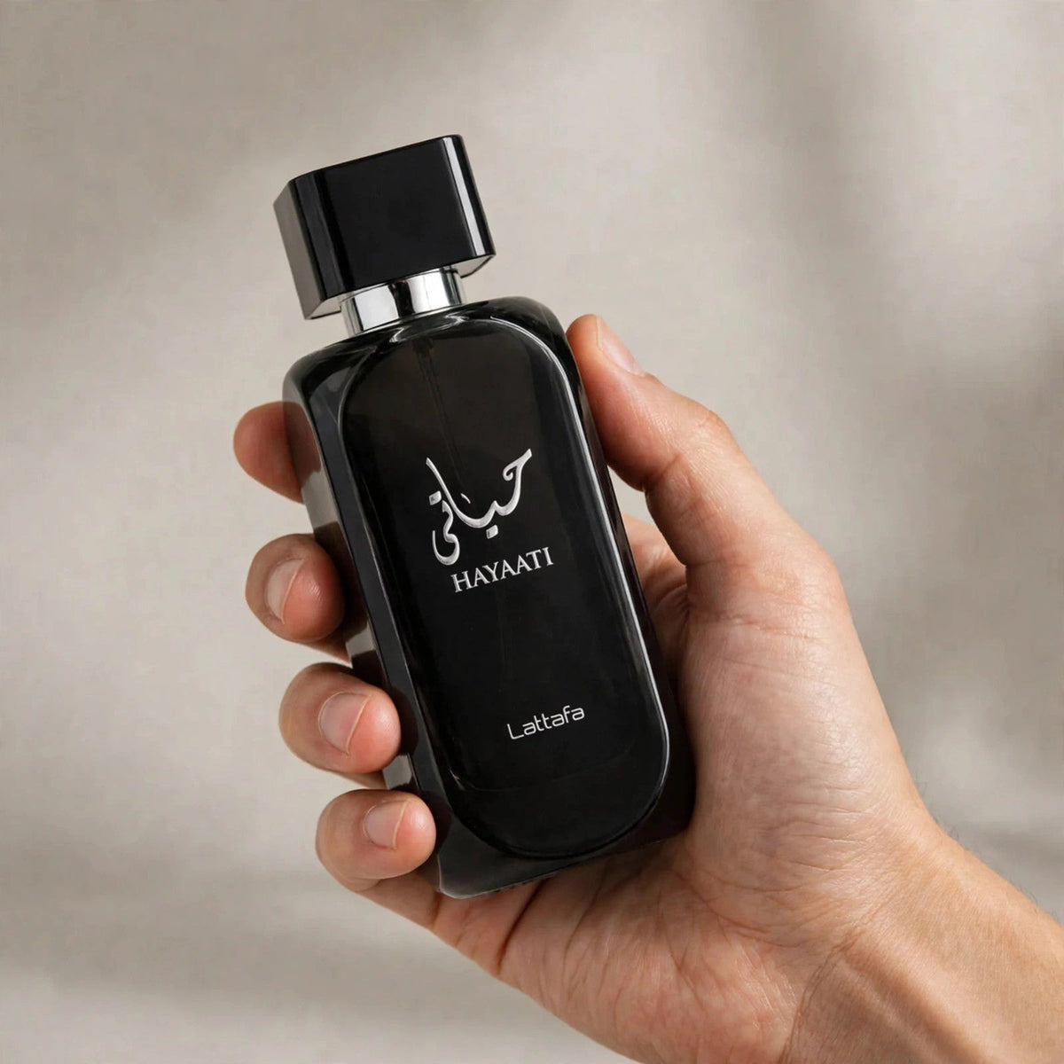 Lattafa Hayaati EDP 100ml / 3.4oz for Unisex — hand-held shot