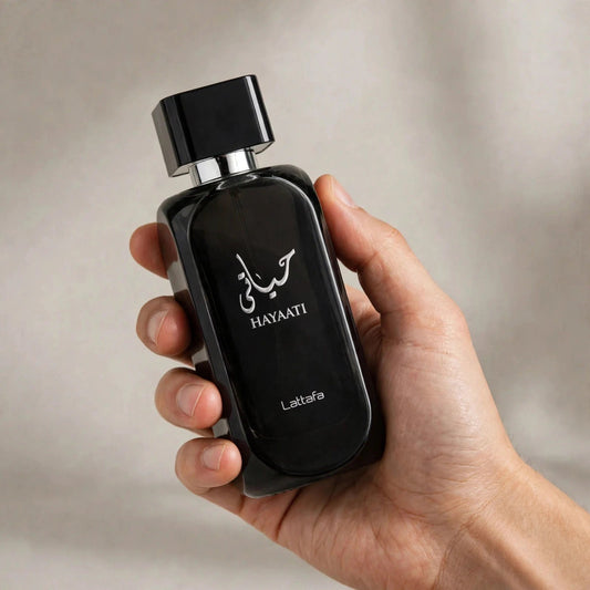 Lattafa Hayaati EDP 100ml / 3.4oz for Unisex — hand-held shot