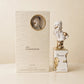Lattafa Her Confession Eau de Parfum bottle in cream setting