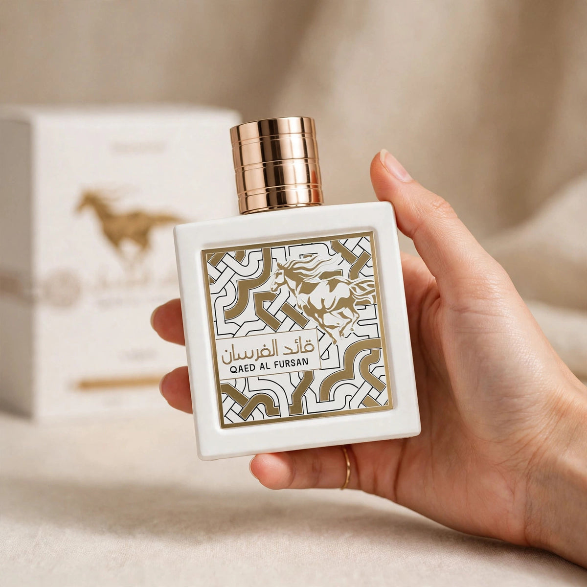 Lattafa Qaed Al Fursan Unlimited Eau de Parfum 90ml for Unisex bottle and box held in hand