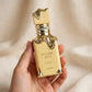 Lattafa Eclaire Banoffi Eau de Parfum 100ml for Unisex bottle and box held in hand