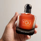 Emporio Armani Stronger With You Absolutely Eau de Parfum 100ml/3.4oz for Men – held in hand