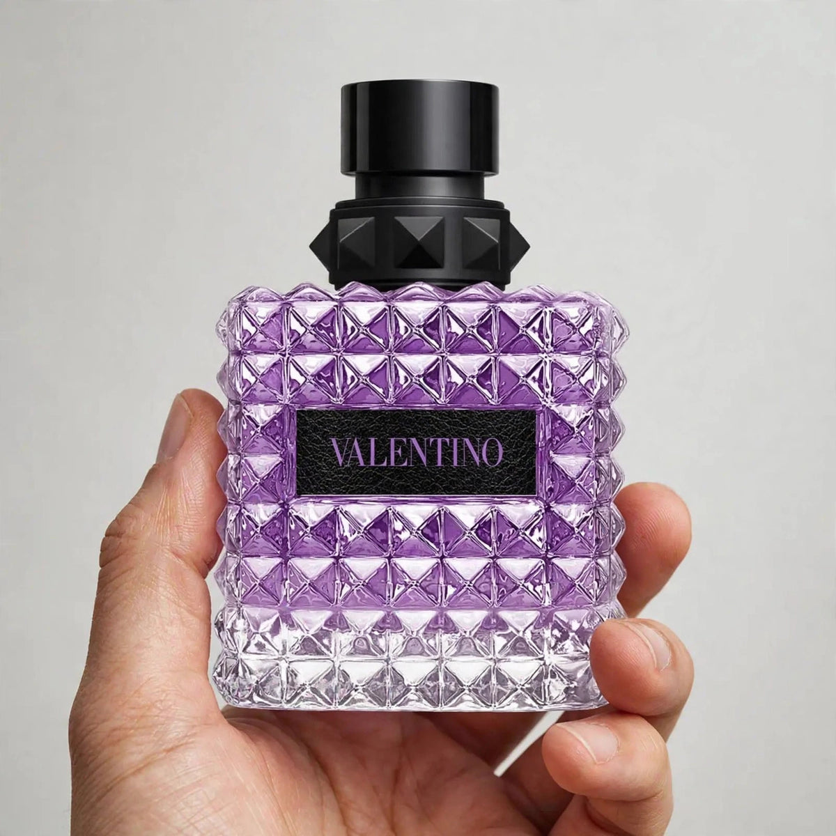 Valentino Donna Born In Roma Purple Melancholia Eau de Parfum 100ml/3.4oz for Women – held in hand