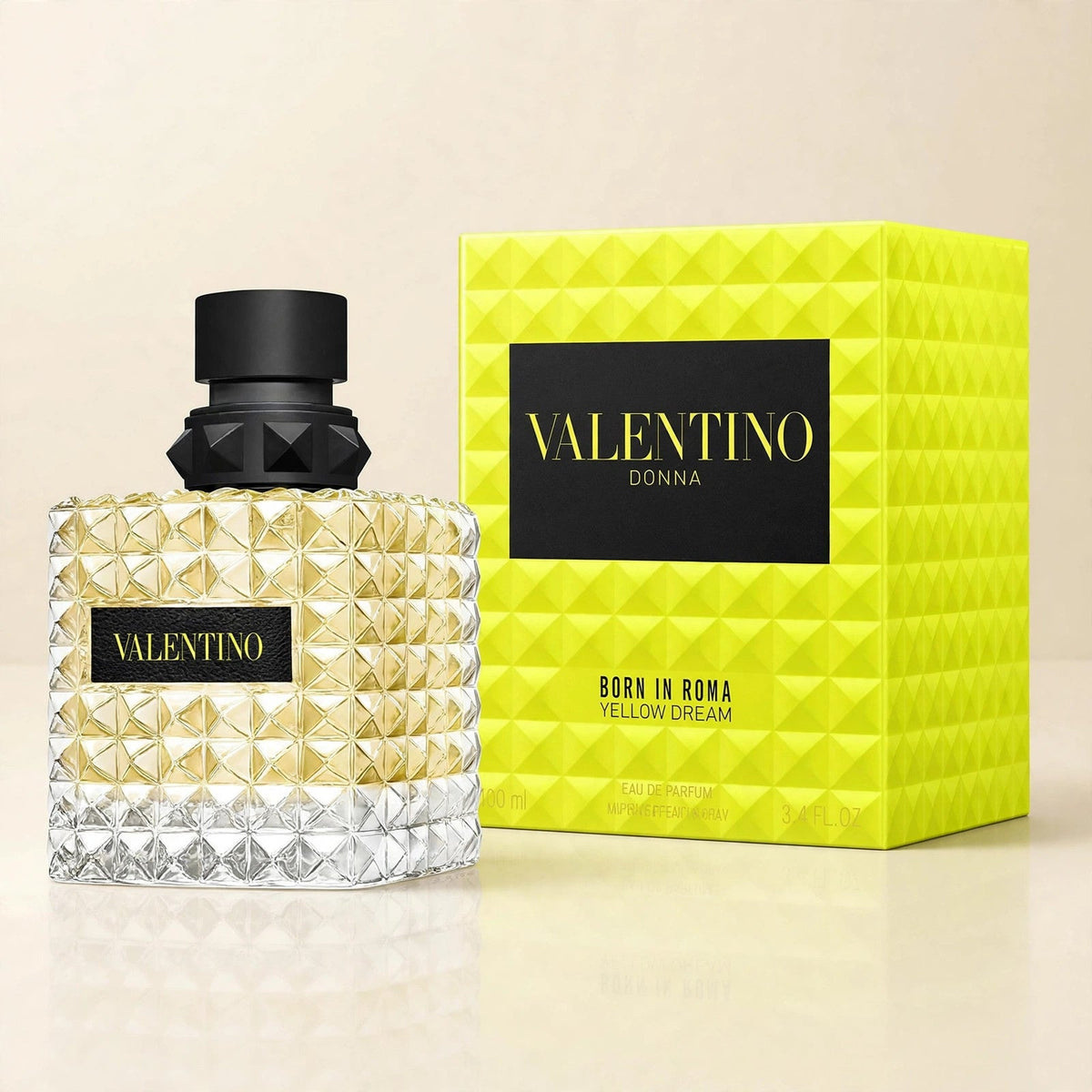 Valentino Donna Born In Roma Yellow Dream EDP in a cream studio setting