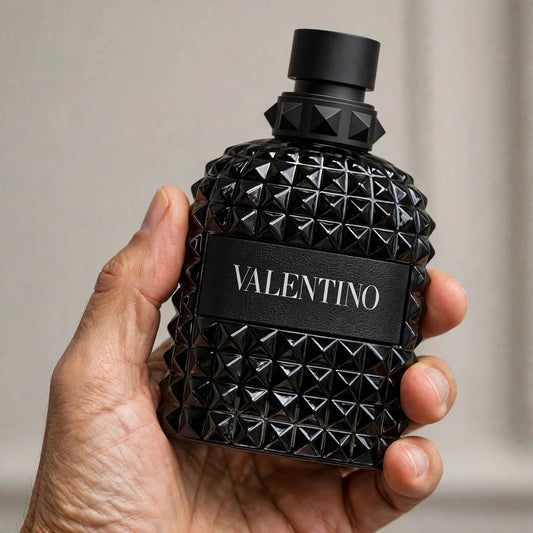 Valentino Uomo Born In Roma Rockstud Noir EDT 100ml bottle — hand holding