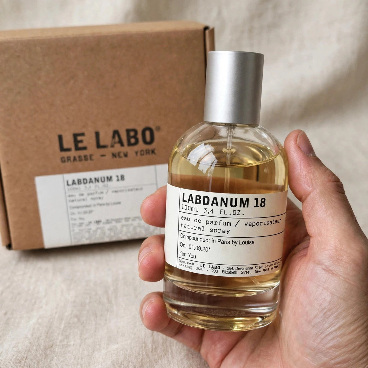 Le Labo Labdanum 18 Eau de Parfum 100ml bottle — hand holding