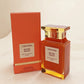 Tom Ford Bitter Peach EDP in a cream studio setting