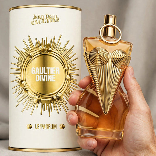 Hand holding Jean Paul Gaultier Gaultier Divine Le Parfum perfume bottle