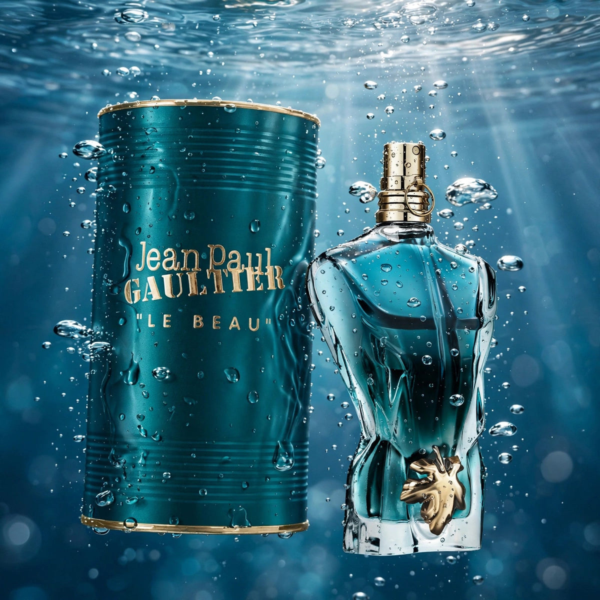 Jean Paul Gaultier Le Beau EDT bottle in clear water splash