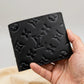 Louis Vuitton Multiple Monogram Wallet – Men's Slender Canvas — hand product photo