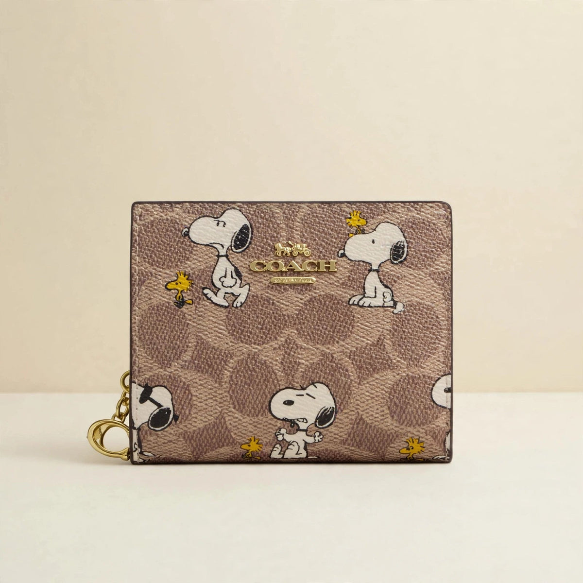 Coach x Peanuts Snap Wallet – Signature Canvas Snoopy Print — cream product photo