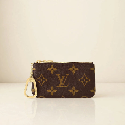 Louis Vuitton Monogram key pouch in cream studio