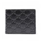 Gucci black Jumbo GG bi-fold wallet on white background