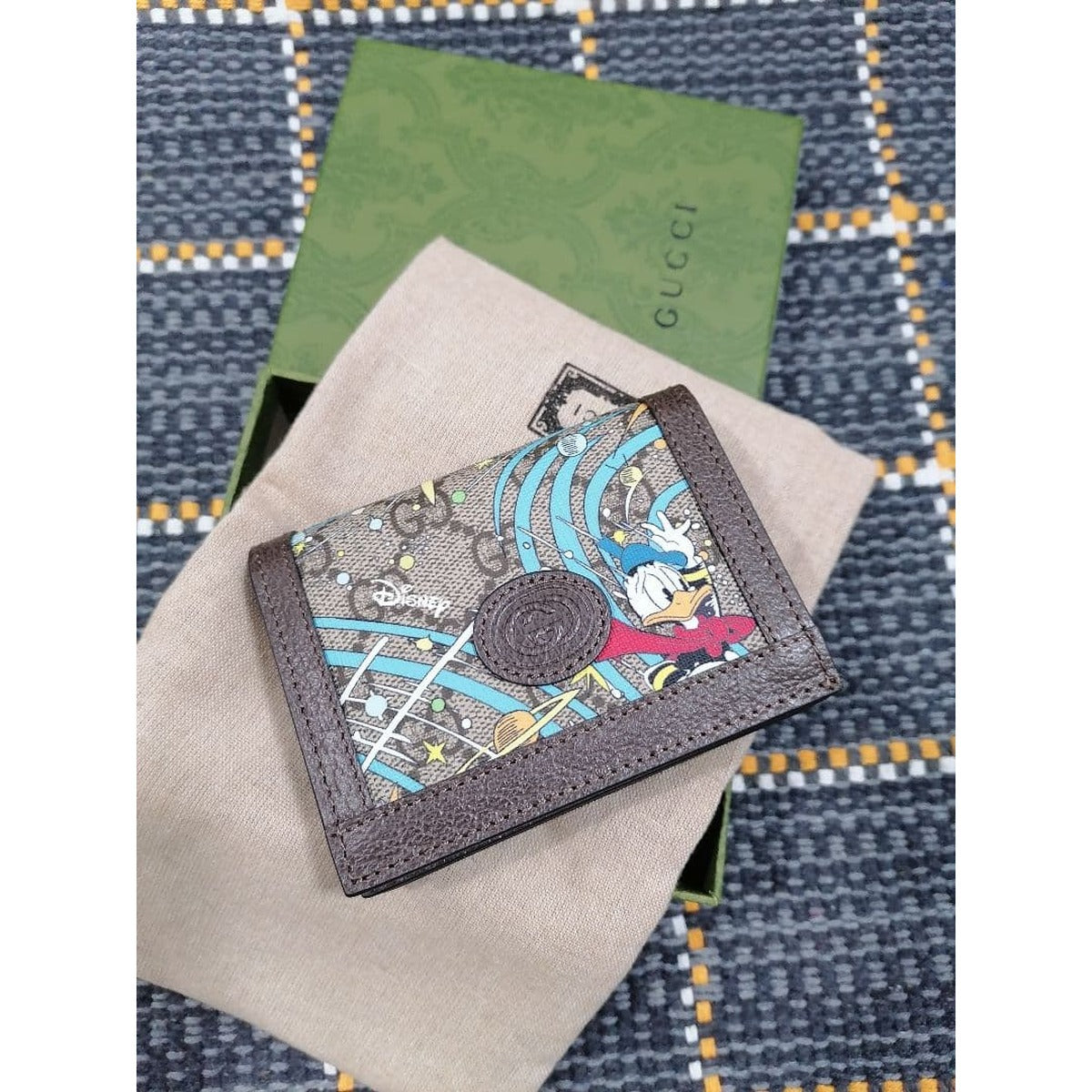 Gucci Disney Donald Duck wallet on dust bag