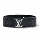 Louis Vuitton LV Slim Monogram Eclipse bracelet on white background