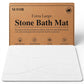 Diatomaceous earth stone bath mat on white background