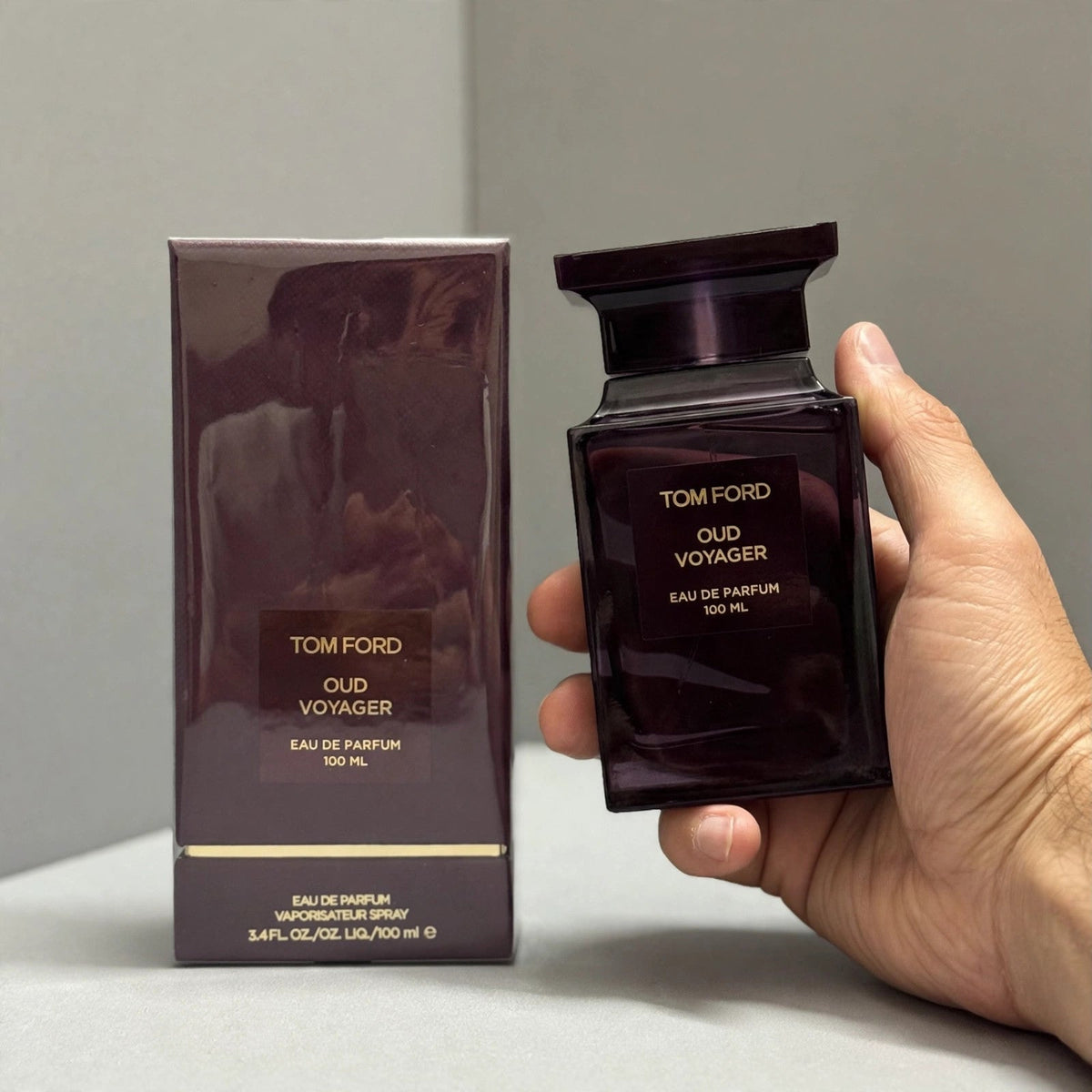 Tom Ford Oud Voyager Eau de Parfum 100ml Unisex — hand holding bottle