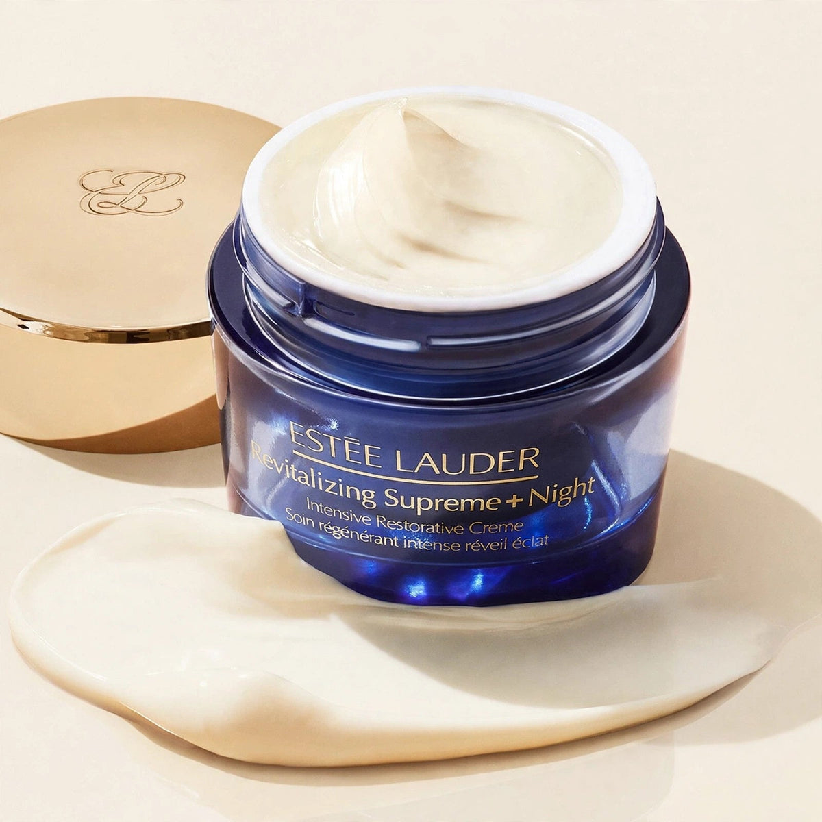 Estee Lauder Revitalizing Supreme Night creme in cream studio setting