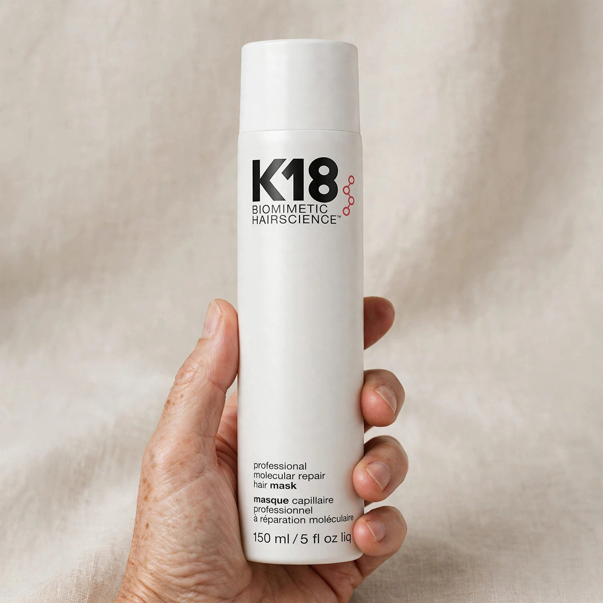 K18 Leave-In Molecular Repair Hair Mask 5 fl oz – hand image