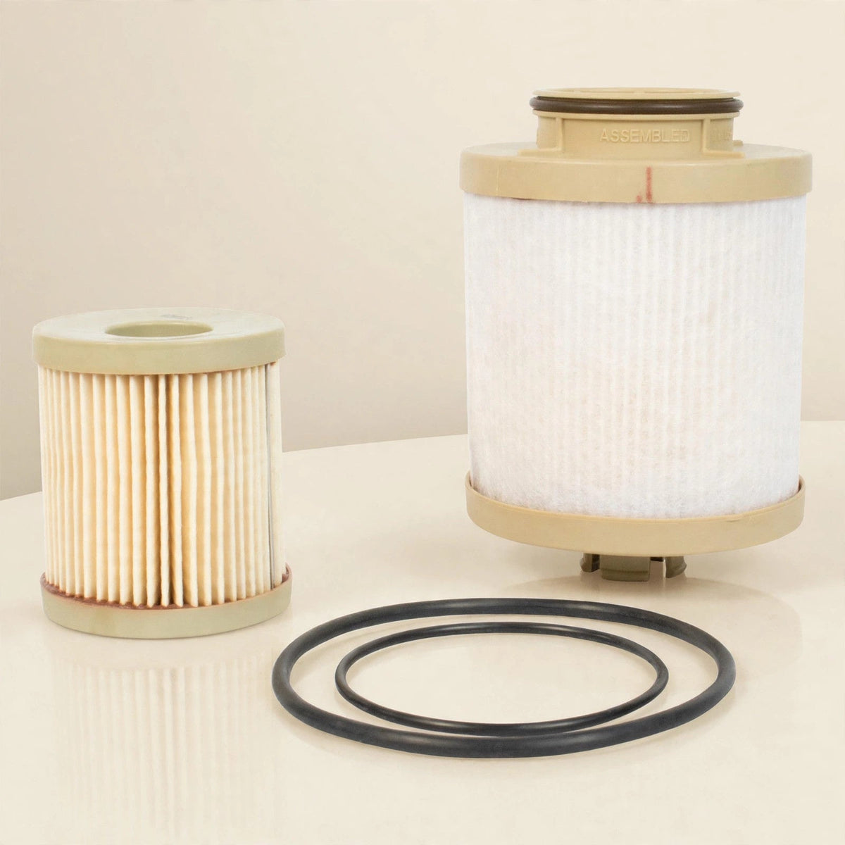 Motorcraft FD-4616 diesel fuel filter kit in a cream studio setting