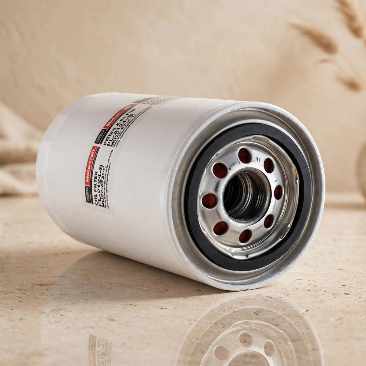 Motorcraft FL-2124-S oil filter in a warm beige studio