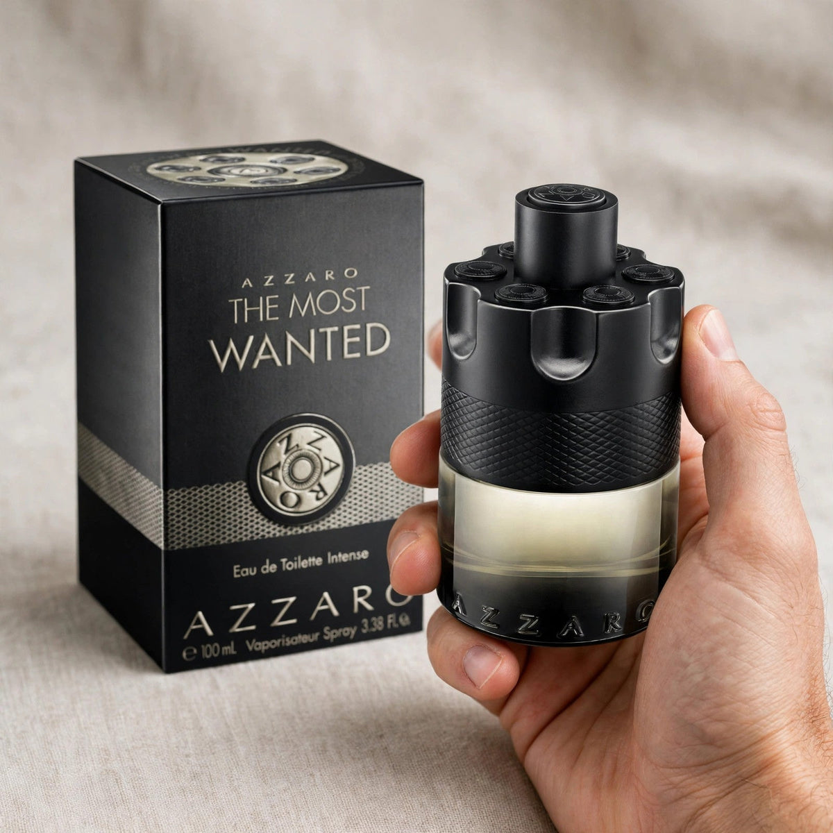 Azzaro The Most Wanted Eau de Parfum Intense 100ml bottle held in hand