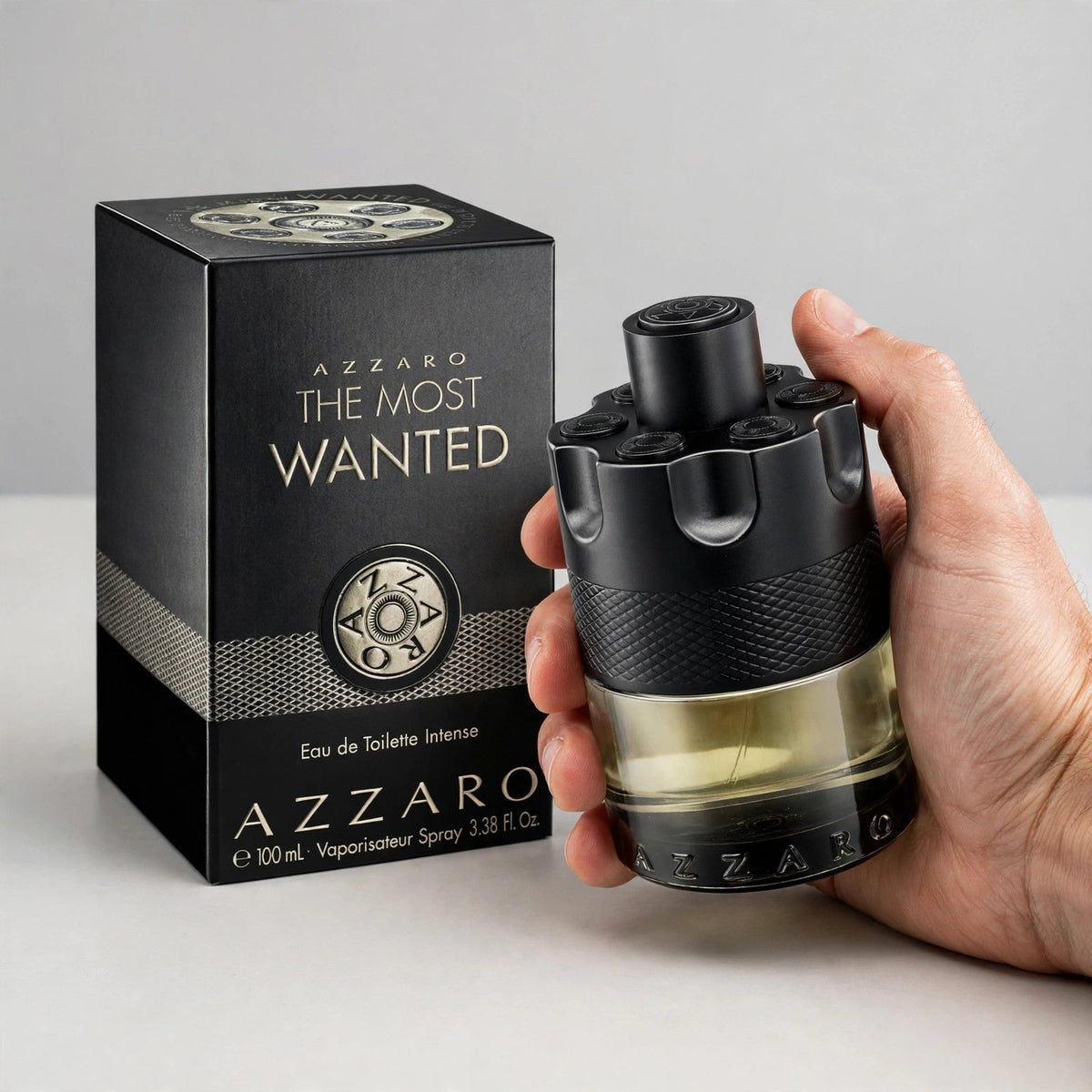 Azzaro The Most Wanted Eau de Toilette Intense 100ml / 3.4oz for Men bottle held in hand