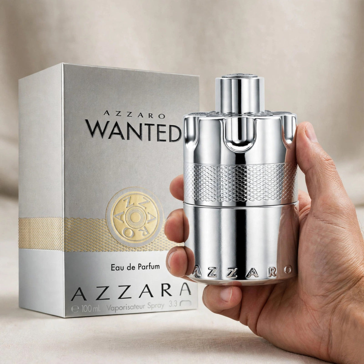 Azzaro Wanted Eau de Parfum 100ml / 3.3oz for Men bottle held in hand