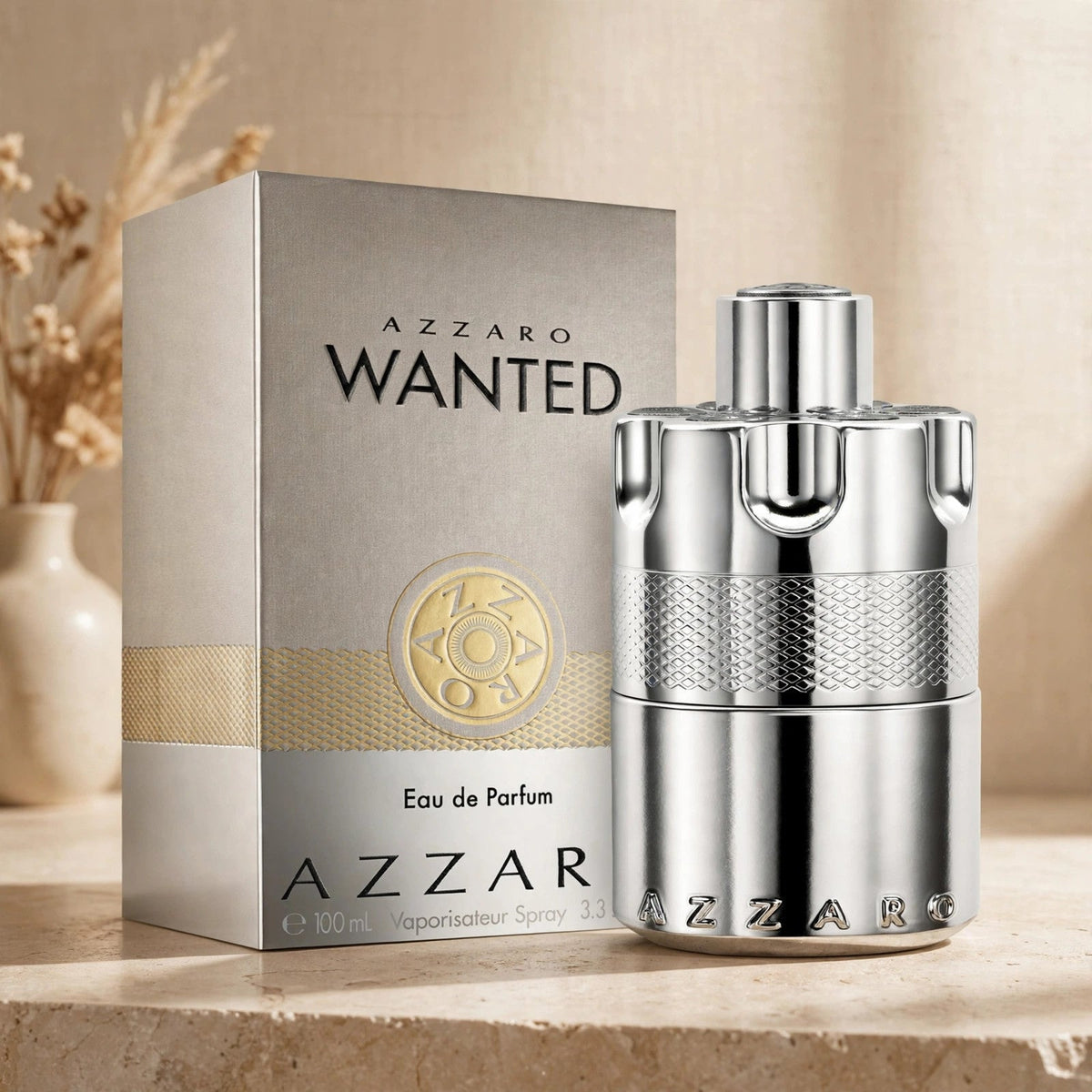 Azzaro Wanted Eau de Parfum 100ml / 3.3oz for Men bottle and box in warm beige studio