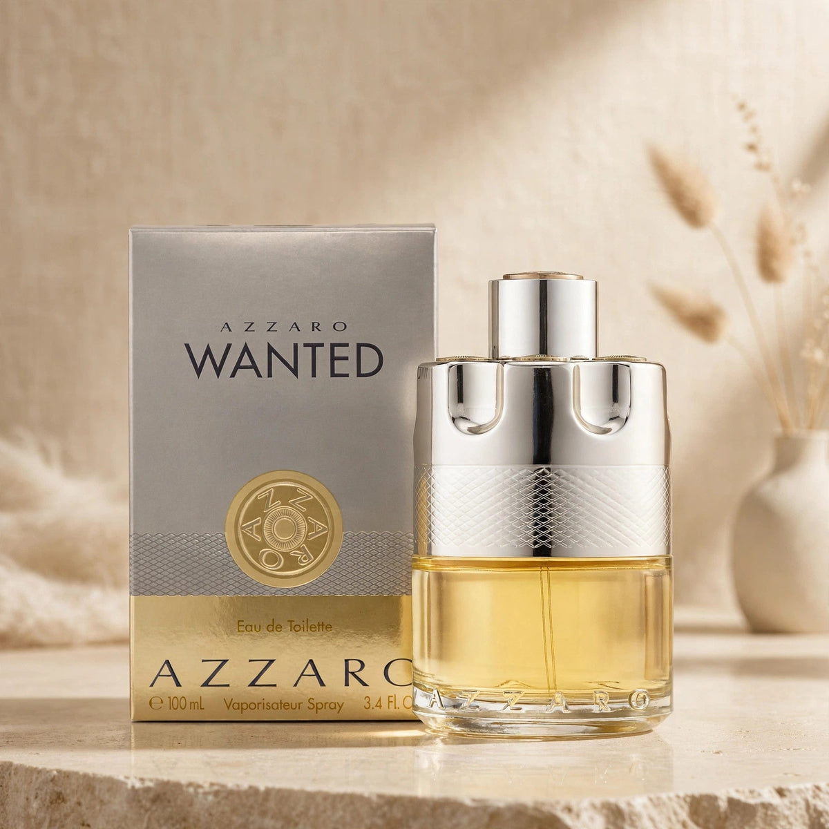 Azzaro Wanted Eau de Toilette 100ml bottle and box in warm beige studio